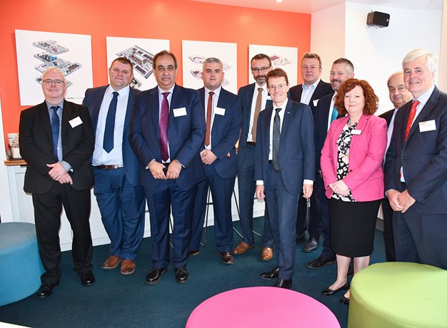 The partners include (third from left) Jan Chaudhry-van der Velde, managing director of West Midlands Trains, and (sixth from left) Mayor of the West Midlands Andy Street